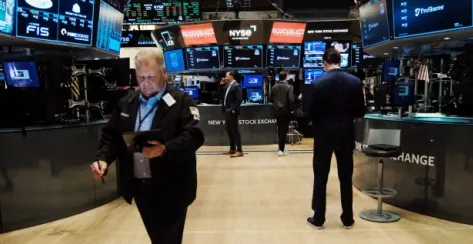 Scene at the NYSE with employees on the floor