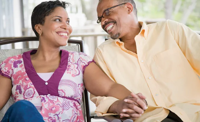 Close-up of a mature couple smiling
