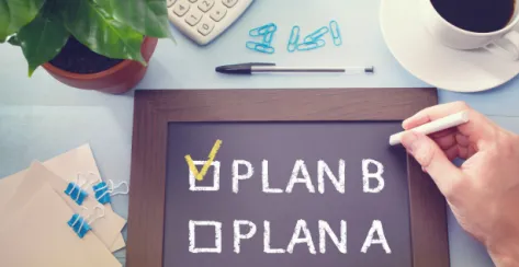 Chalkboard with the words "Plan B" checked off.